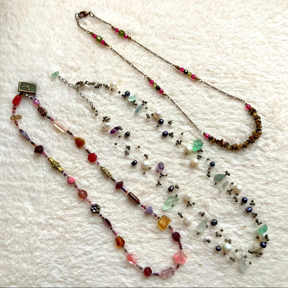 Bundle of beaded necklaces, pinks/browns/greens